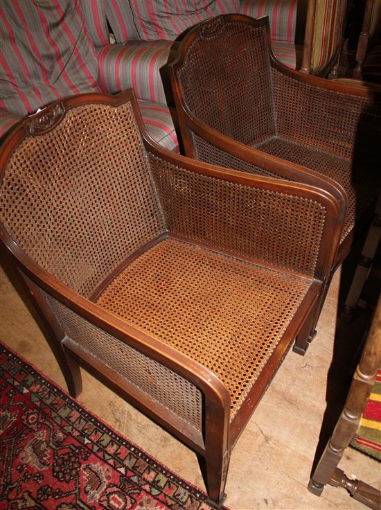 Pair of mahogany and canework bergeres